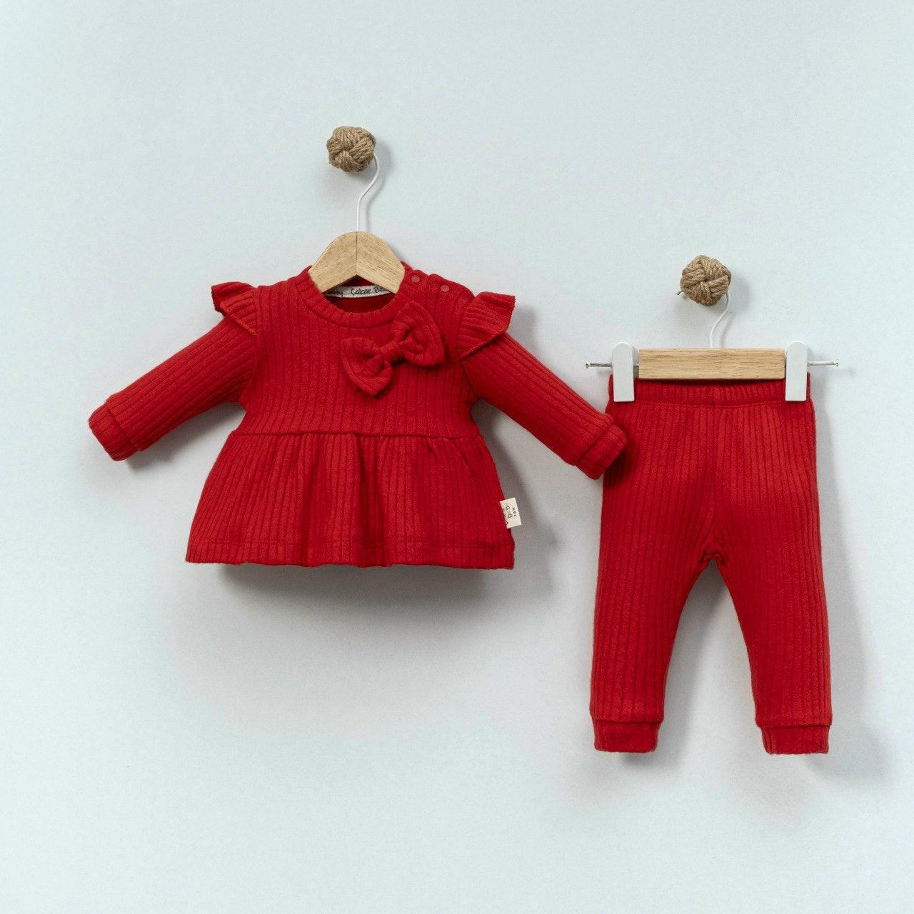 Red Knitted Baby Outfit – Peplum Top & Ribbed Pants Set with Ruffles and Bow Detail